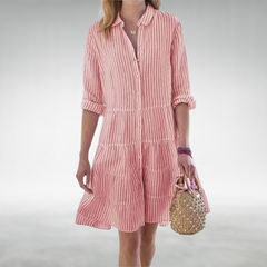 Pink striped button-front midi dress with tiered ruffle hem and rolled sleeves
