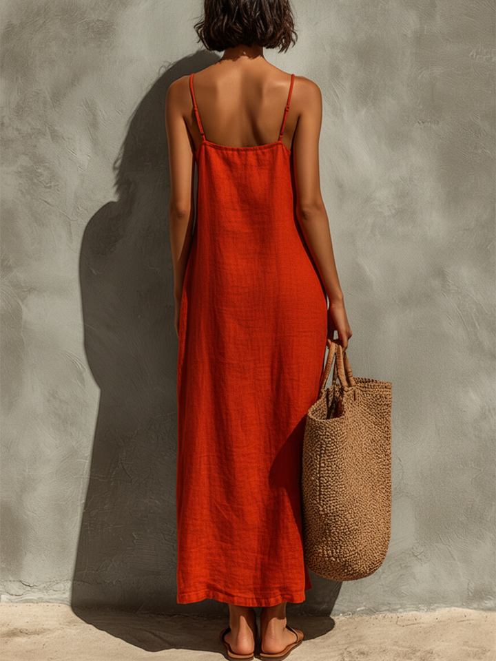 Red sleeveless midi dress back view with thin straps and scoop back neckline