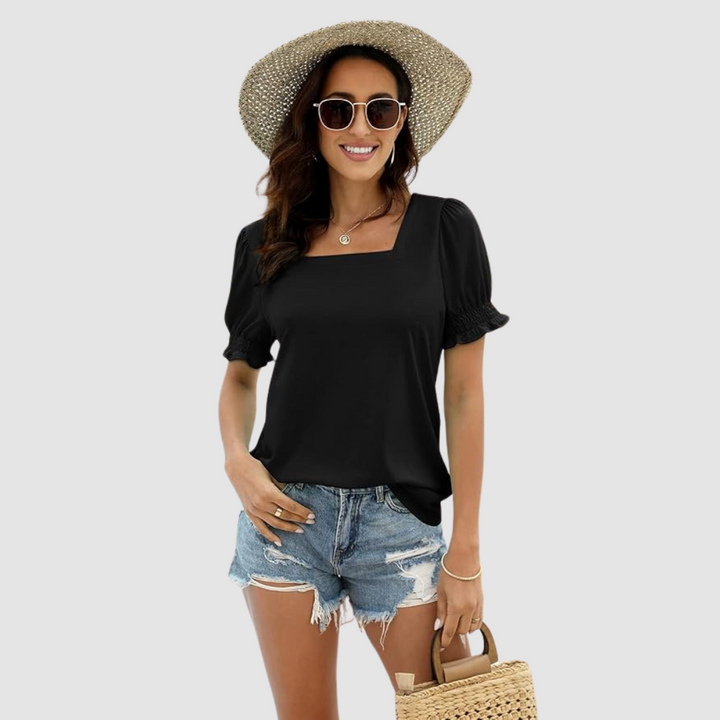 Black square-neck blouse with short puff sleeves and gathered cuffs.