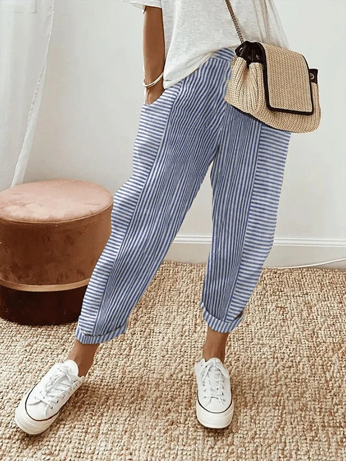 Blue striped trousers, wide-leg style with cuffed ankles
