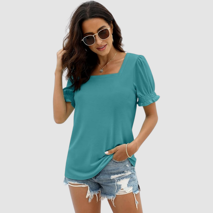 Teal square-neck blouse with short puff sleeves and gathered cuffs.