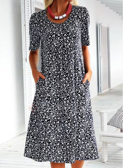 Black round-neck floral dress with white speckle print and short sleeves