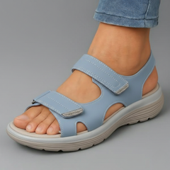 Sky blue orthopaedic support sandal with adjustable hook-and-loop straps and cushioned sole