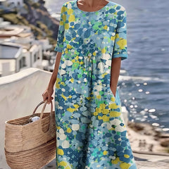 Blue floral summer midi dress with short sleeves, round neckline, gathered waist