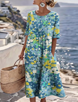 Blue floral summer midi dress with short sleeves, round neckline, gathered waist