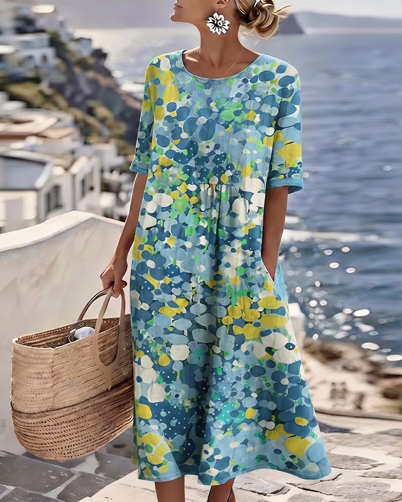 Blue floral summer midi dress with short sleeves, round neckline, gathered waist