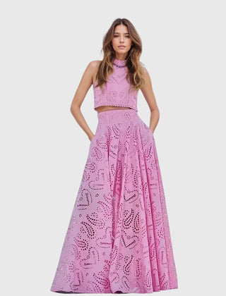 Pink two-piece set with sleeveless lace crop top and full midi skirt