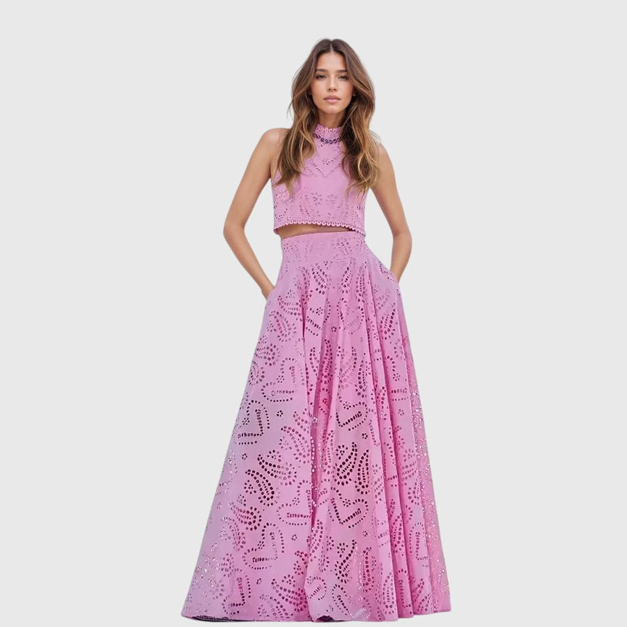 Pink two-piece set with sleeveless lace crop top and full midi skirt