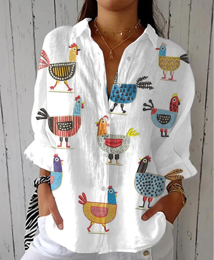 White cotton-linen blouse with colorful rooster and chicken embroidery, button-front