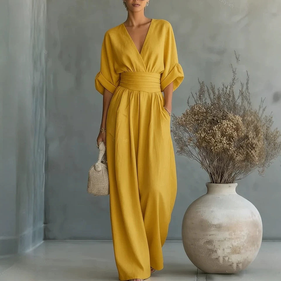 Women’s wide-leg jumpsuit in mustard yellow with V-neck and gathered waist