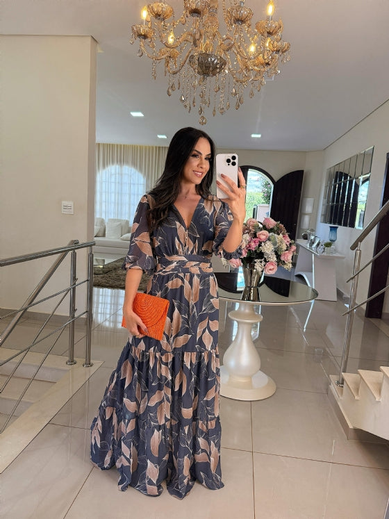 Blue floral maxi dress with tie waist and short flutter sleeves