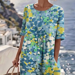 Blue floral print midi dress with scoop neckline and short puff sleeves