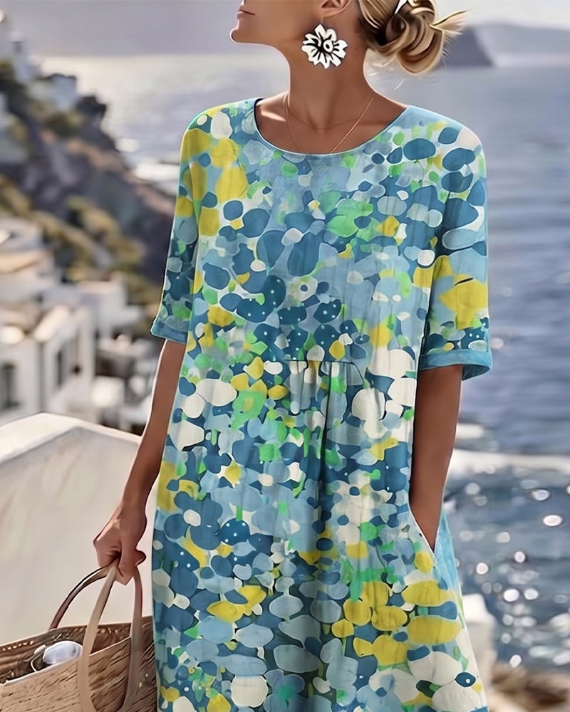 Blue floral print midi dress with scoop neckline and short puff sleeves