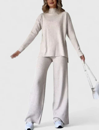 Ribbed knit two-piece set in light tone, with turtleneck top and wide-leg pants