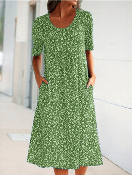 Green round-neck floral dress with white speckle print and short sleeves