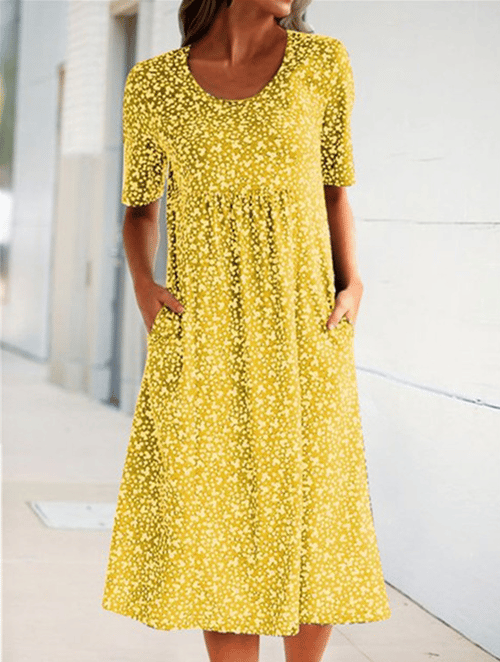 Yellow round-neck floral dress with white speckle print and short sleeves
