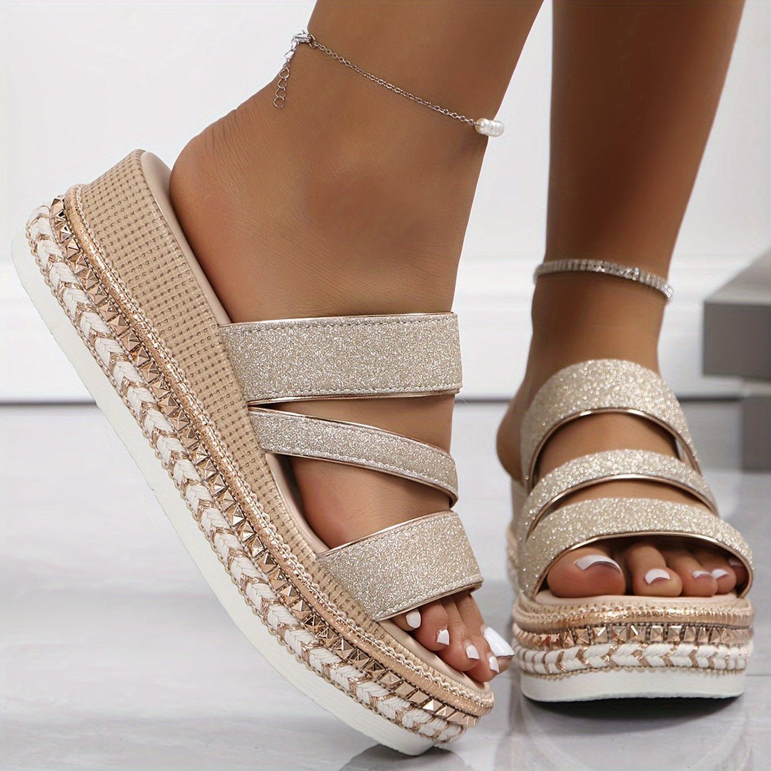 Gold glitter slide sandals with three strap bands and braided espadrille platform