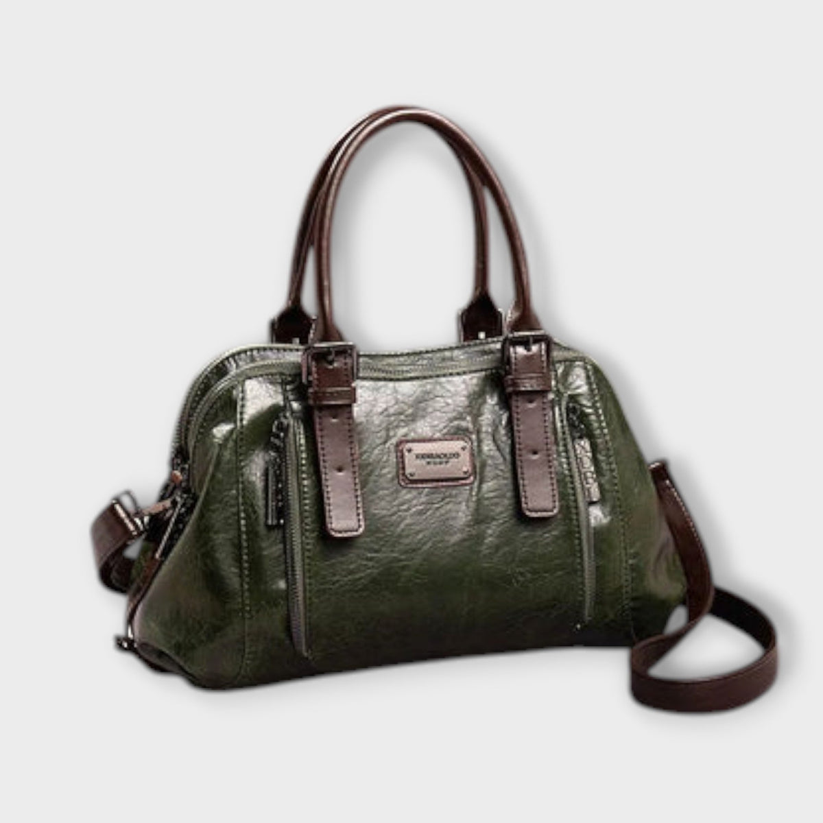 Green leather-look shoulder bag with top handles, front logo plaque, zip top, crossbody strap.