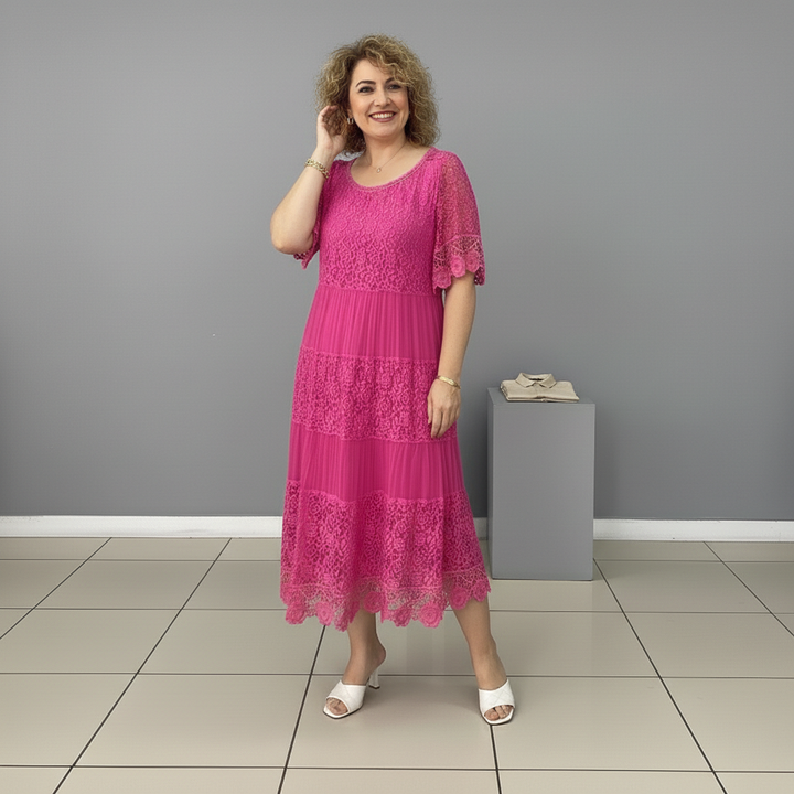 Pink lace tiered midi dress with flutter sleeves and round neckline