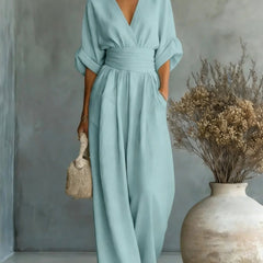 Women’s wide-leg jumpsuit in light blue, V-neck, elastic waist, dolman sleeves