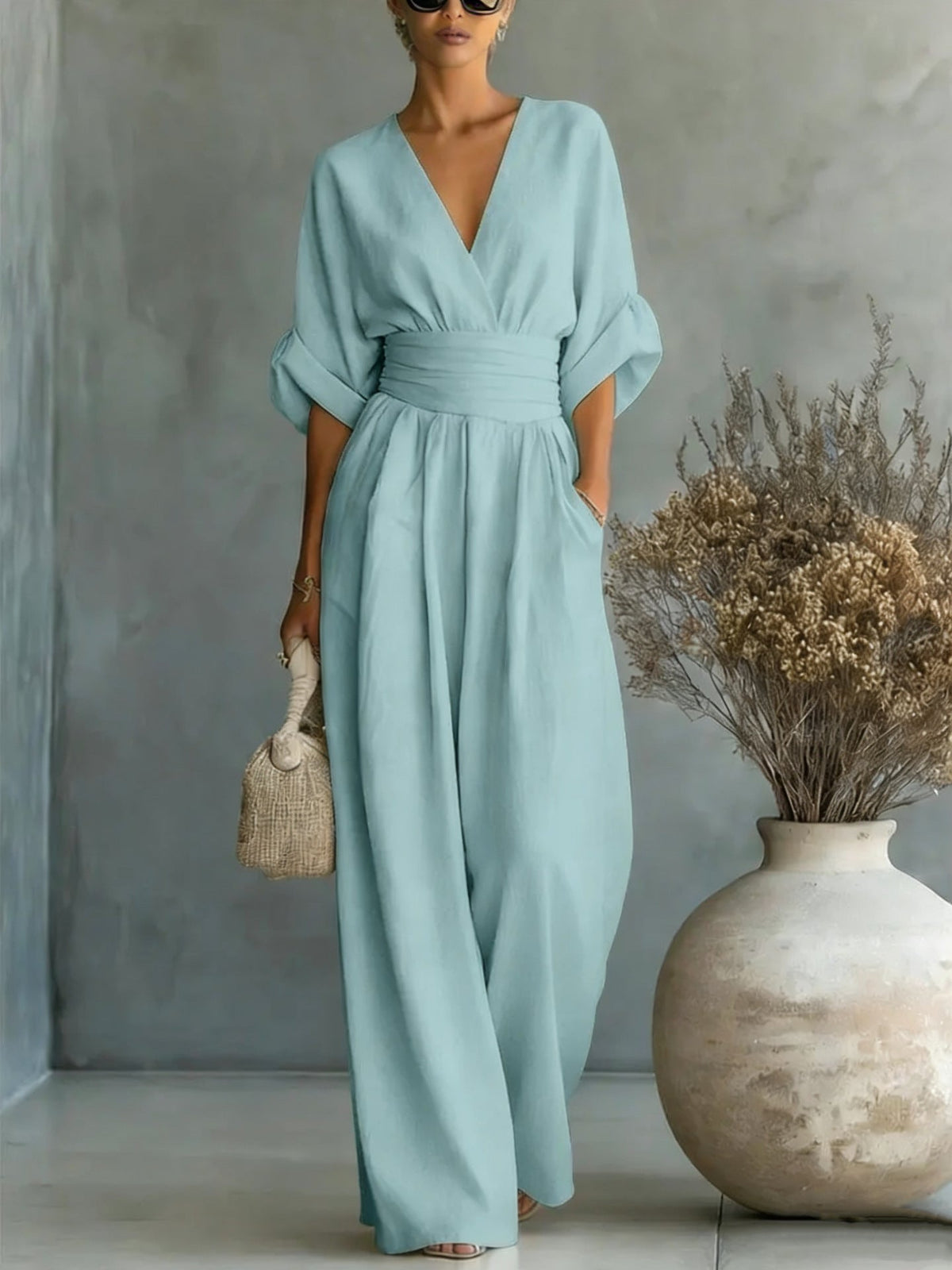 Women’s wide-leg jumpsuit in light blue, V-neck, elastic waist, dolman sleeves