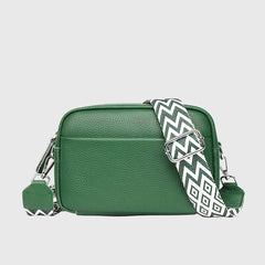 Green leather shoulder bag with chevron strap and silver-tone side hardware