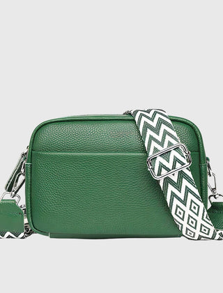 Green leather shoulder bag with chevron strap and silver-tone side hardware