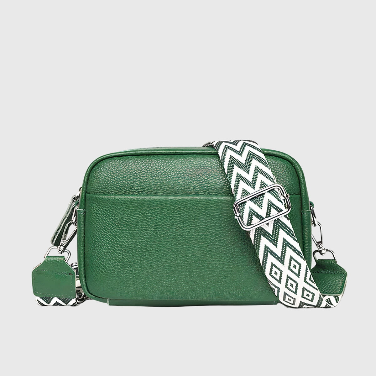 Green leather shoulder bag with chevron strap and silver-tone side hardware