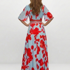 Back-view floral V-neck maxi dress in light blue with red blooms, contrast waist tie