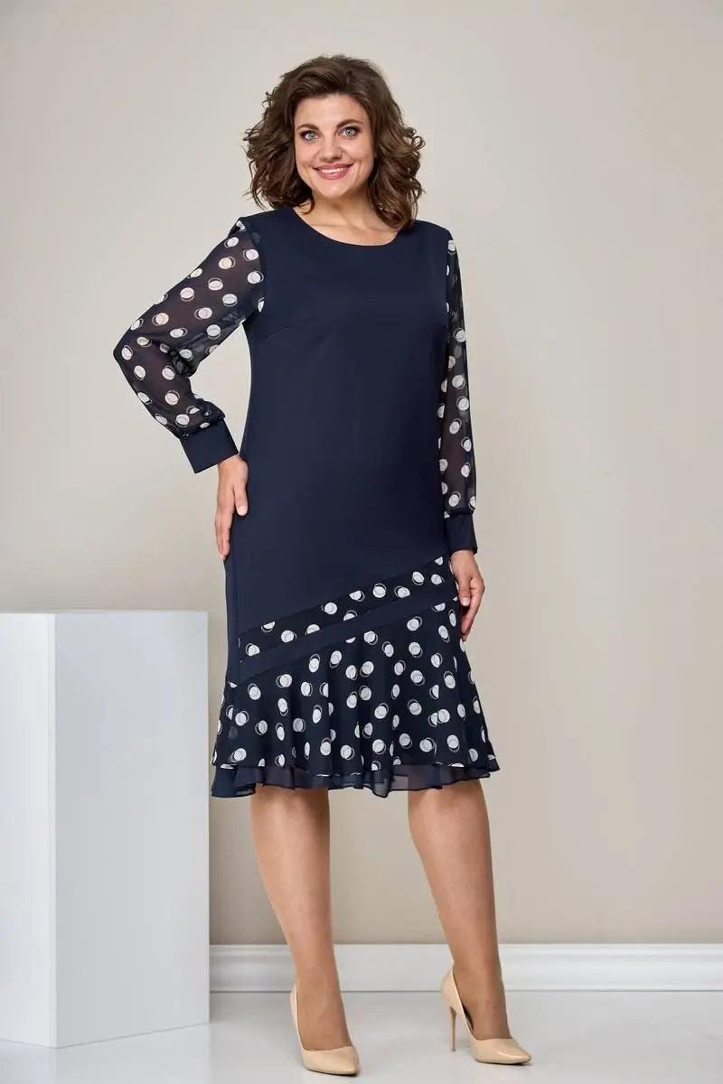 Navy chiffon dress with polka-dot chiffon sleeves and ruffled hem
