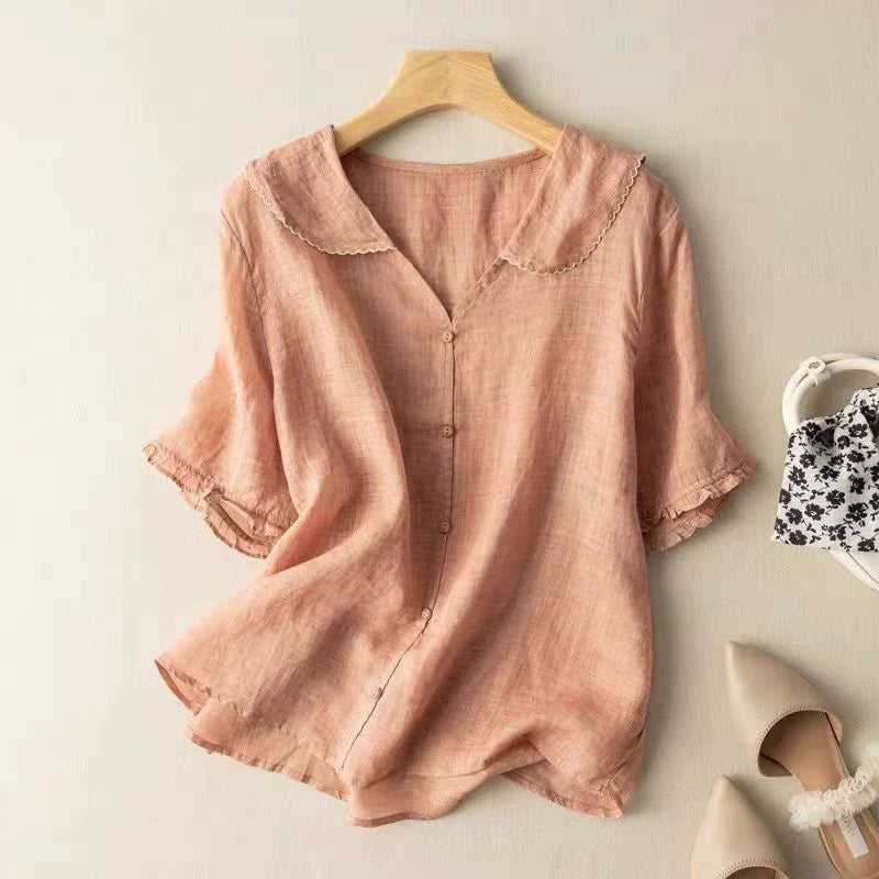 Pink cotton short-sleeve blouse with scalloped peter pan collar and button front