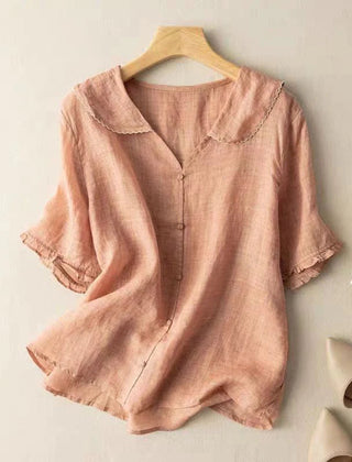 Pink cotton short-sleeve blouse with scalloped collar and button front