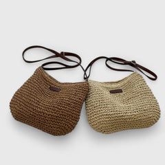 Two woven half-moon shoulder bags: dark brown and beige with leather strap