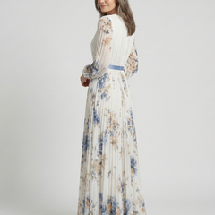 Floral V-neck long-sleeve maxi dress with pleats and blue waist sash, side view