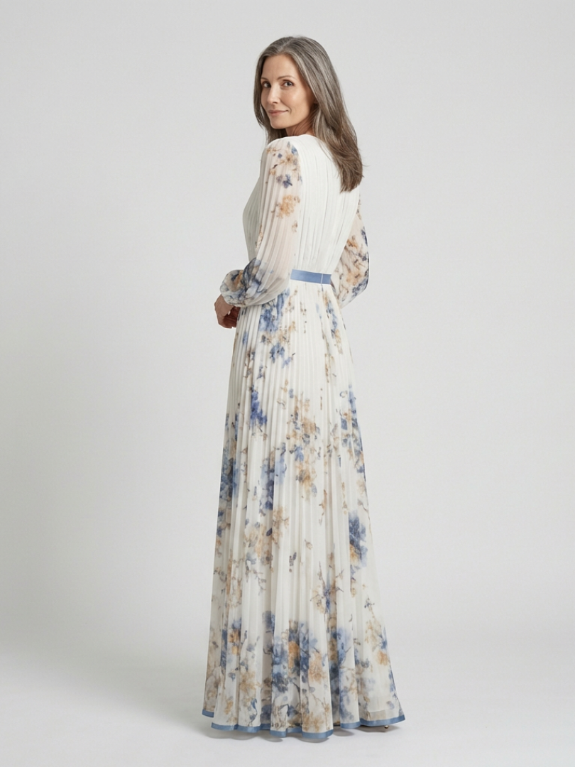 Floral V-neck long-sleeve maxi dress with pleats and blue waist sash, side view