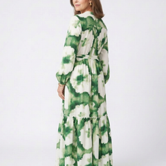 Long sleeve tiered maxi dress with green and white tie-waist detail, side view