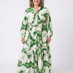 Long sleeve tie-waist tiered maxi dress with tiered skirt and green floral print