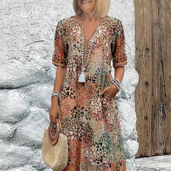 Floral midi dress with V-neck button front, short sleeves and tassel trim (beige/pink)