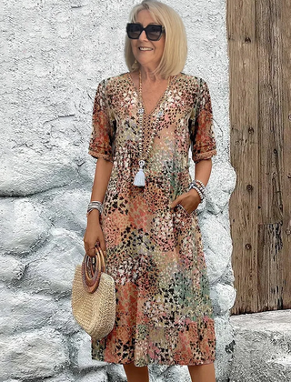 Floral midi dress with V-neck button front, short sleeves and tassel trim (beige/pink)