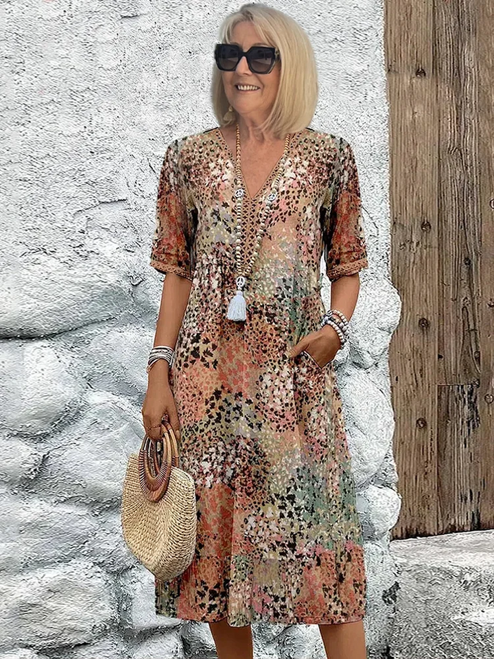Floral midi dress with V-neck button front, short sleeves and tassel trim (beige/pink)