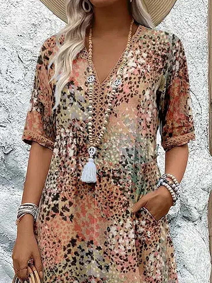 Floral midi dress with V-neck, button front, short sleeves and tassel trim (beige)
