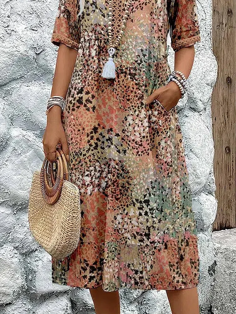 Floral midi dress with V-neck button placket, short sleeves and tassel trim (beige mix)