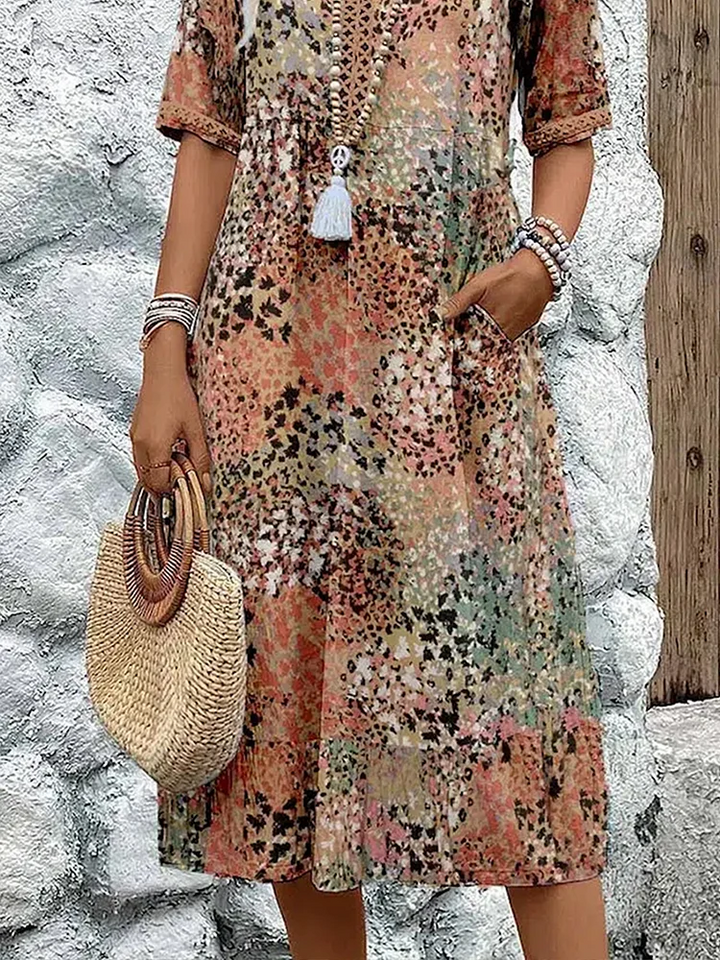 Floral midi dress with V-neck button placket, short sleeves and tassel trim (beige mix)