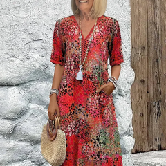 Floral midi dress with V-neck button front, short sleeves and tassel trim (red)