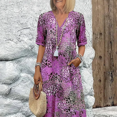 Floral midi dress with V-neck button front, short sleeves and tassel trim (purple)