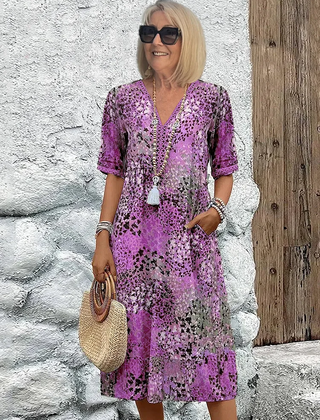 Floral midi dress with V-neck button front, short sleeves and tassel trim (purple)