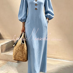 Blue v-neck maxi dress with button front and lantern sleeves