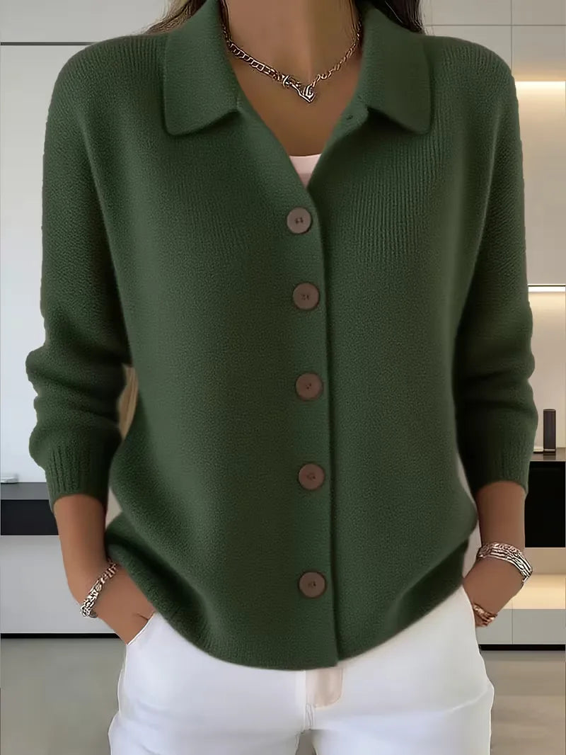 Dark green button-front knit cardigan with point collar and dark buttons, long sleeves