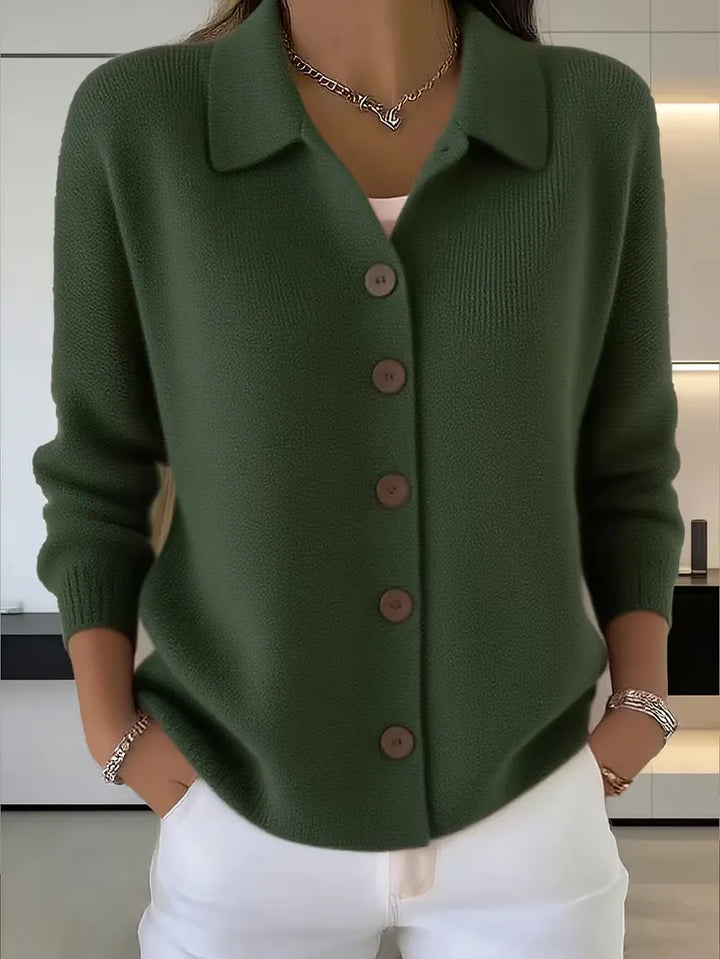 Dark green button-front knit cardigan with point collar and dark buttons, long sleeves