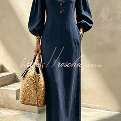 Navy blue v-neck maxi dress with button front and lantern sleeves